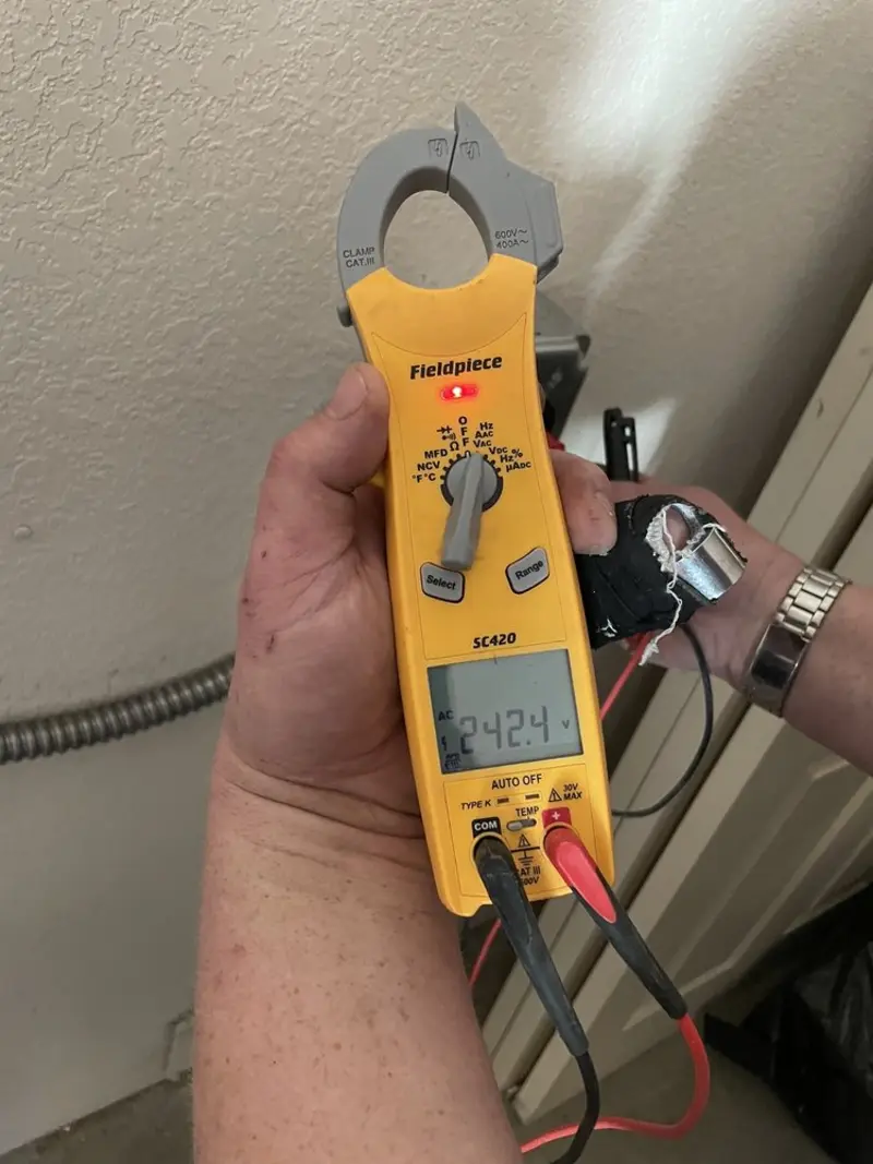 Voltage testing with clamp meter during Aluminum Wiring Replacement in Wallace